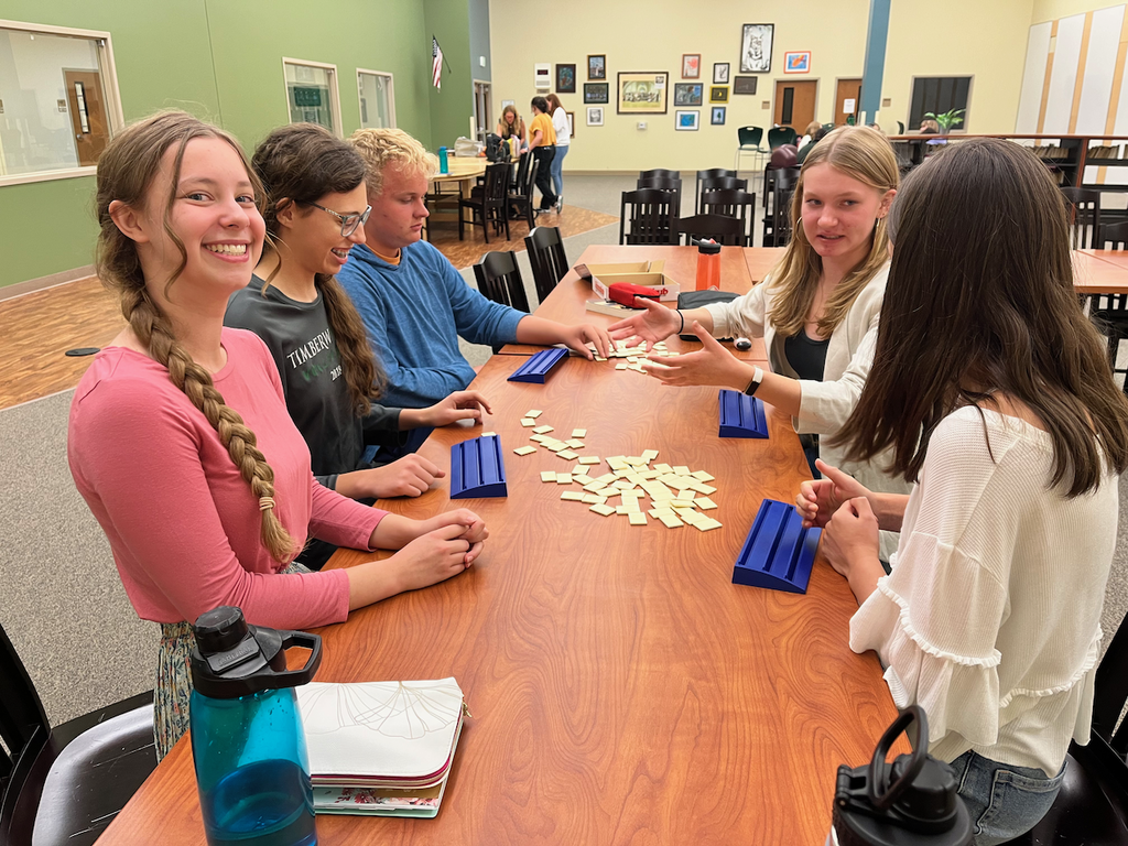 Student Ambassadors playing a board game